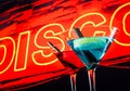 Blue and red cocktail with neon disco word background with space for text