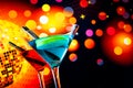 Blue and red cocktail with sparkling disco ball background with space for text Royalty Free Stock Photo