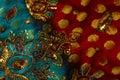 Blue-red fabric with golden embroidery Royalty Free Stock Photo