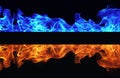 Blue and red fire on black background Royalty Free Stock Photo