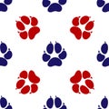 Blue and red footprint of an animal dog icon isolated seamless pattern on white background. Vector Illustration Royalty Free Stock Photo