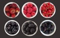 Blue and red fruits and berries isolated on black. Sweet and juicy berry with copy space for text. Top view. Mulberries, blackberr Royalty Free Stock Photo