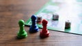 Blue, red and green plastic chips, checkers and dice. Royalty Free Stock Photo