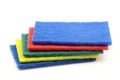 Blue, red, green and yellow abrasive pads