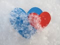 The blue and red heart with very in the snow