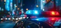 Blue and red light flasher atop of a police car. City lights on the background Royalty Free Stock Photo