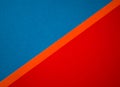 Blue , red and orange diagonally divided colored paper textured background