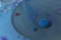 Blue and red spheres with colorful fluid background Royalty Free Stock Photo