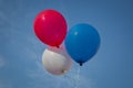 Blue,red, white balloon isolated on a blue background .Blue, red, white balloon sky background Royalty Free Stock Photo