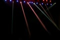 Blue, red and white concert stage show party lights on black background Royalty Free Stock Photo