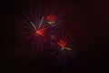 Blue, red and white fireworks against the backdrop of the night sky Royalty Free Stock Photo