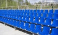 Blue, red, white rows of seats on the stadium Royalty Free Stock Photo