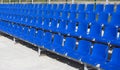 Blue, red, white rows of seats on the stadium Royalty Free Stock Photo