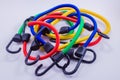 Blue, Red, Yellow, and Green Bungee Cords Royalty Free Stock Photo
