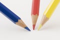 Blue red and yellow pencil tips on paper Royalty Free Stock Photo