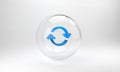 Blue Refresh icon isolated on grey background. Reload symbol. Rotation arrows in a circle sign. Glass circle button. 3D