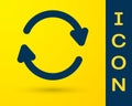 Blue Refresh icon isolated on yellow background. Reload symbol. Rotation arrows in a circle sign. Vector Illustration