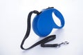 Blue retractable leash for dogs on a white background Royalty Free Stock Photo