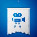 Blue Retro cinema camera icon isolated on blue background. Video camera. Movie sign. Film projector. White pennant