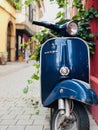 Blue retro vespa at italian street