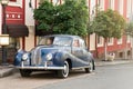 Blue retro vintage car, bmv auto in european street, summer day Royalty Free Stock Photo