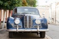 Blue retro vintage car, bmv auto in european street, summer day Royalty Free Stock Photo