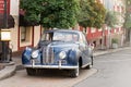 Blue retro vintage car, bmv auto in european street, summer day Royalty Free Stock Photo