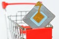 Blue RFID tag on supermarket trolley. Goods security and alarm. Shoplifting Prevention. Free space for an inscription. Light