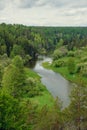 The blue ribbon of the river from the height of the mountains. Wild nature, taiga. Tourism. Far East, Sakhalin Island, Russia. Royalty Free Stock Photo