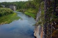 The blue ribbon of the river from the height of the mountains. Wild nature, taiga. Tourism. Far East, Sakhalin Island, Russia. Royalty Free Stock Photo