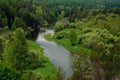 The blue ribbon of the river from the height of the mountains. Wild nature, taiga. Tourism. Far East, Sakhalin Island, Russia. Royalty Free Stock Photo