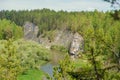 The blue ribbon of the river from the height of the mountains. Wild nature, taiga. Tourism. Far East, Sakhalin Island, Russia. Royalty Free Stock Photo