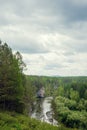 The blue ribbon of the river from the height of the mountains. Wild nature, taiga. Tourism. Far East, Sakhalin Island, Russia. Royalty Free Stock Photo