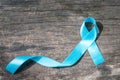 Blue ribbon symbolic of prostate cancer awareness campaign and men`s health in November
