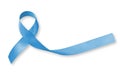 Blue ribbon symbolic for prostate cancer awareness campaign and men`s health in November isolated on white background