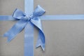 Blue ribbons with bow on grey background Royalty Free Stock Photo