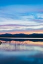 Blue Ridge mountains reflect in rain inspired Lake Wilson near Brevard