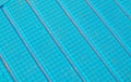 Blue ridged surface texture with square grid and diagonal grooves Royalty Free Stock Photo