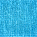 Blue rippled water background in swimming pool Royalty Free Stock Photo