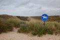 Blue road sign for riders on the beach in De Putten in Netherlands