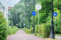 Blue road sign or signal of bicycle lane among new buildings Royalty Free Stock Photo