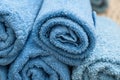 blue rolled bath towels in bathroom Royalty Free Stock Photo