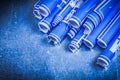 Blue rolled blueprints on metallic background construction conce Royalty Free Stock Photo