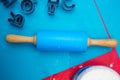 Blue rolling pin with letters forms