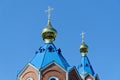 Blue roofs of russian orthodox church against clear blue sky. Cathedral of Our Lady of Kazan