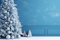 Blue room wall mock up with copy space decorated in Christmas style with pine tree and copy space