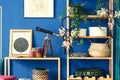 Blue room with wooden bookshelf