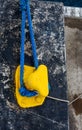 Blue Rope Around Yellow Cleat Royalty Free Stock Photo