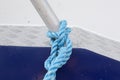 Blue Rope Knot Tied to Metal Pole Royalty Free Stock Photo