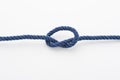 Blue rope with a tied knot Royalty Free Stock Photo